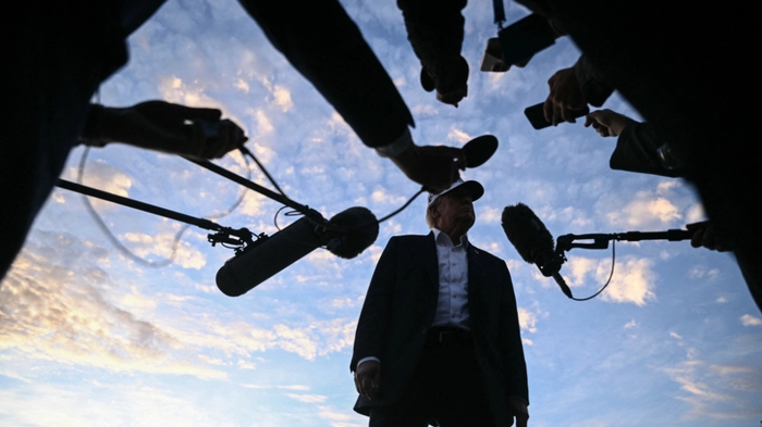 US President Donald Trump speaks to members of the media before boarding Air Force One to leave from Shannon Airport, western Ireland on September 13, 2026, after attending the final day of the Irish Open golf tournament in nearby Doonbeg. (Photo by Brendan SMIALOWSKI / AFP)