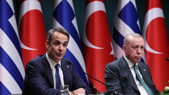 Greek Prime Minister Kyriakos Mitsotakis (L) addresses the media during a joint press conference with Turkish President Recep Tayyip Erdogan (R) at the Presidential Complex in Ankara, on February 11, 2026. (Photo by Adem ALTAN / AFP)
