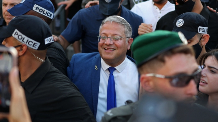 Israel's National Security Minister Itamar Ben Gvir (C) takes part in the Jerusalem Day parade at the Damascus Gate in the old city of Jerusalem on May 14, 2026. Every year, thousands of Israeli nationalists, many of them religious Jews, march through Jerusalem and its annexed Old City, including in predominantly Palestinian neighbourhoods, waving Israeli flags, dancing and sometimes shouting inflammatory slogans. (Photo by Ilia YEFIMOVICH / AFP)