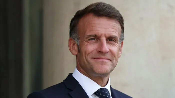 France's President Emmanuel Macron reacts as he welcomes European Commission President ahead of their meeting at The Elysee Presidential Palace in Paris on July 22, 2026. (Photo by SIMON WOHLFAHRT / AFP)