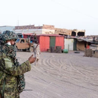 Soldiers from the National Front for the Liberation of Azawad (FLA) patrol the streets of Kidal, on May 8, 2026. Mali's government refuses to talk to "terrorist" armed groups, the foreign minister has said, days after jihadists and allied separatists mounted unprecdented attacks against the junta. The coordinated deadly offensive by Al-Qaeda-linked jihadists and Tuareg separatists on April 25 and 26 targeted strategic towns and killed the country's influential defence minister. (Photo by AFP)
