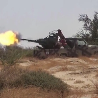 This frame grab taken from AFPTV video footage shows fighters affiliated with the Saudi-backed Yemeni government engaging in clashes with Houthi authorities in Al-Jawf province on September 15, 2026. The Saudi-led coalition battling Yemen's Houthi authorities accused them on September 16 of targeting Islam's holy city Mecca, sparking outrage across the Muslim world. Houthi authorities swiftly rejected as a "lie" Riyadh's statement that it had shot down a drone heading towards Mecca, which attracts millions of pilgrims each year. Fresh fighting between the Iran-backed Houthi authorities and Yemen's Saudi-backed internationally recognised government has dragged in the kingdom, with the Houthi authorities declaring a maritime blockade on its ships in the Red Sea. (Photo by AFPTV / AFP)