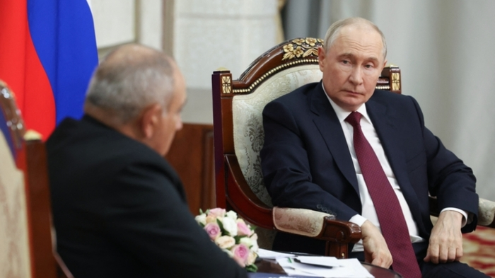In this pool photograph distributed by the Russian state agency Sputnik, Russia's President Vladimir Putin and Armenian Prime Minister Nikol Pashinyan hold a meeting on the sidelines of the Shanghai Cooperation Organisation (SCO) summit in Bishkek on September 1, 2026. (Photo by Vyacheslav PROKOFYEV / POOL / AFP)