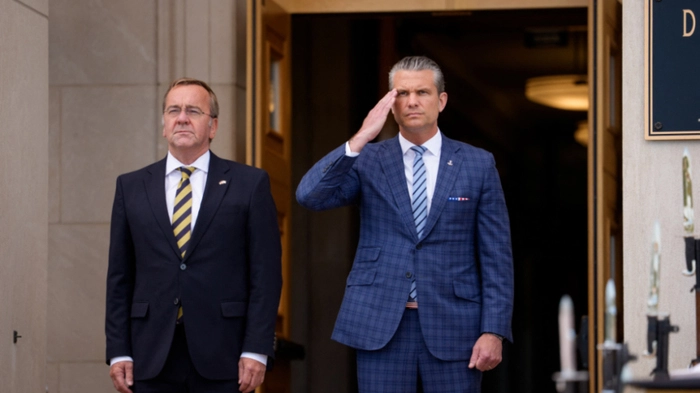ARLINGTON, VIRGINIA - SEPTEMBER 15: U.S. Secretary of Defense Pete Hegseth (R) salutes during the playing of the U.S. national anthem as he welcomes German Defense Minister Boris Pistorius (L) during an enhanced honor cordon at the Pentagon on September 15, 2026 in Arlington, Virginia. Hegseth and Pistorius met to discuss a range of bilateral issues. Andrew Harnik/Getty Images/AFP (Photo by Andrew Harnik / GETTY IMAGES NORTH AMERICA / Getty Images via AFP)