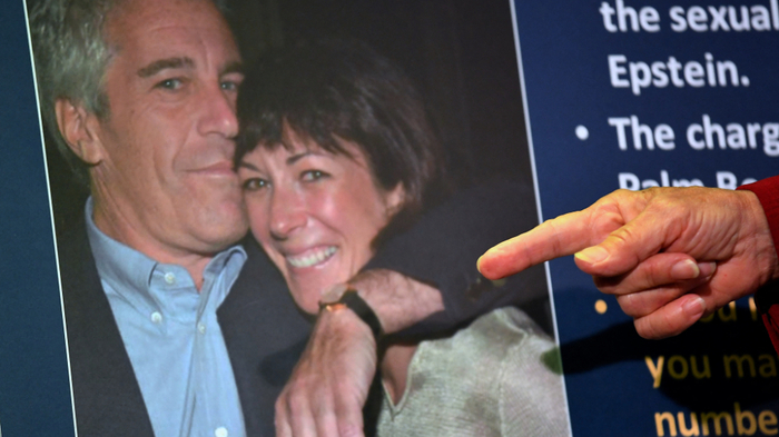 (FILES) This July 2, 2020, file photo shows Acting US Attorney for the Southern District of New York, Audrey Strauss, pointing to a photo of Jeffrey Epstein and Ghislaine Maxwell while announcing charges against Maxwel during a press conference in New York City. A US federal judge on August 25, 2026, rejected a bid by Ghislaine Maxwell, a key accomplice of notorious sex offender Jeffrey Epstein, to throw out her conviction on sex trafficking charges. Maxwell, 64, has been sentenced to 20 years in prison and is the only person convicted of a crime in connection with Epstein, who died in a New York jail cell in 2019 while awaiting his own trial. (Photo by Johannes EISELE / AFP)