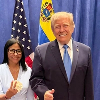 This handout picture released by the Venezuelan Presidency press office shows Venezuela's interim President Delcy Rodriguez and U.S. President Donald Trump posing for a picture during a meeting in New York on September 22, 2026. Venezuela's interim president, Delcy Rodriguez, described her meeting with U.S. President Donald Trump in New York on September 22 as "historic." (Photo by Handout / Venezuelan Presidency / AFP) / RESTRICTED TO EDITORIAL USE - MANDATORY CREDIT "AFP PHOTO / VENEZUELAN PRESINDENCY / HANDOUT / " - NO MARKETING NO ADVERTISING CAMPAIGNS - DISTRIBUTED AS A SERVICE TO CLIENTS