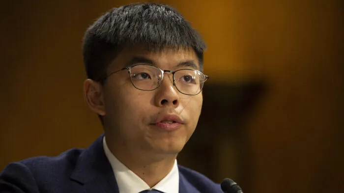 (FILES) Hong Kong pro-democracy activist Joshua Wong speaks during a hearing before the Congressional-Executive Commission on China at the Dirksen Senate Office Building on Capitol Hill in Washington, DC, on September 17, 2019. Hong Kong pro-democracy activist Joshua Wong pleaded guilty to foreign collusion on September 2, 2026 in a second national security trial against him that could see him jailed for life. He is accused of asking foreign countries, individuals or institutions to "impose sanctions or blockade, or engage in other hostile activities" against Hong Kong and China in 2020, after Beijing imposed a national security law on the finance hub. (Photo by Alastair Pike / AFP)