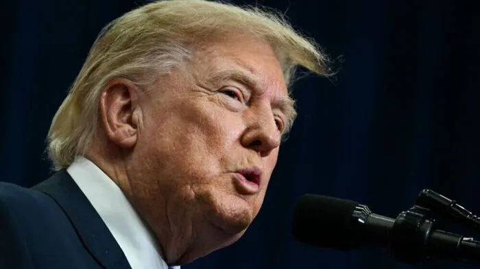 US President Donald Trump speaks at NASA Lyndon B. Johnson Space Center in Houston, Texas, on August 28, 2026, before signing an executive order that aims to create a US space academy. The Artemis II crew are being honored with the Congressional Space Medal of Honor for their historic mission around the Moon. (Photo by Kent NISHIMURA / AFP)