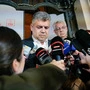 PSD-Chef und Premier Marcel Ciolacu umringt von Journalisten