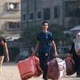 Palästinenser mit ihren Habseligkeiten in Rafah | Palästinenser mit ihren Habseligkeiten in Rafah