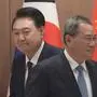 Südkoreas Präsident Yoon Suk Yeol und der chinesische Premier Li Qiang | Südkoreas Präsident Yoon Suk Yeol und der chinesische Premier Li Qiang