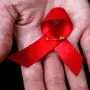 Die rote Schleife ist das Symbol des Welt-Aids-Tags | Die rote Schleife ist das Symbol des Welt-Aids-Tags