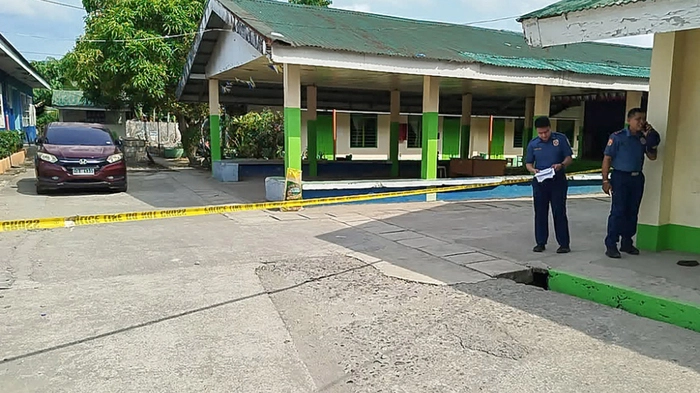 Polizisten am Tatort in Tacloban im Einsatz | Polizisten am Tatort in Tacloban im Einsatz