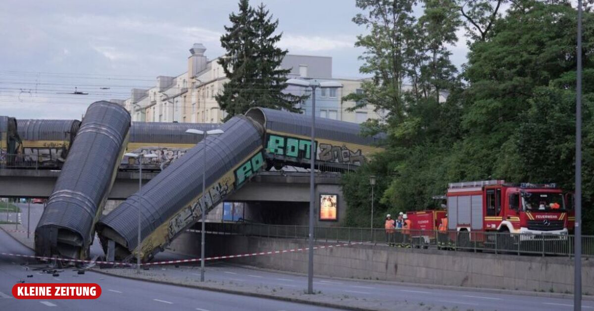 Freight train plunges from bridge: One person dead