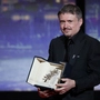 Regisseur Cristian Mungiu mit seiner Goldenen Palme | Regisseur Cristian Mungiu mit seiner Goldenen Palme