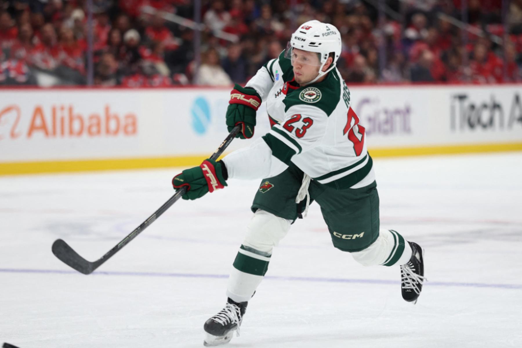 Minnesota z Rossijem premagala Calgary, Detroit s Kasparjem izgubil proti Chicagu