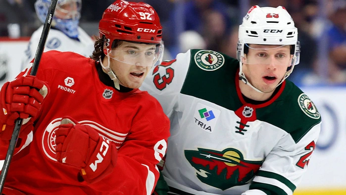 Detroit Red Wings-Stürmer Marco Kasper empfängt Minnesota-Torjäger Marco Rossi