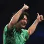 RECORD DATE NOT STATED 18th December 2025, Alexandra Palace, London, England 2025 PDC Paddy Power World Darts Championship Day Eight Motomo Sakai walks on in his Round One match against Thibault Tricole PUBLICATIONxNOTxINxUK IanxStephen