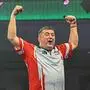 21/12/2025. 2025/26 World Darts Championship Mensur Suljovic celebrates the win during the 2025/26 Paddy Power World Darts Championships at Alexandra Palace, London, United Kingdom on 21 December 2025. Editorial use only , Copyright: xWaynexTuckwellx PSI-23379-0141