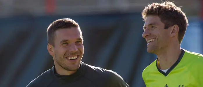Lukas Podolski (links) hört auf