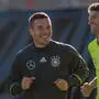 Lukas Podolski (links) hört auf