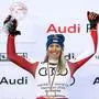 SAALBACH,AUSTRIA,23.MAR.24 - ALPINE SKIING - FIS World Cup Final, downhill, ladies. Image shows the rejoicing of Cornelia Huetter (AUT). Keywords: trophy, crystal globe. Photo: GEPA pictures/ Mario Buehner-Weinrauch