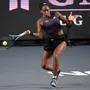 USA's Coco Gauff returns the ball to USA's Jessica Pegula during their women's singles match of the WTA Finals tennis championships in Cancun, Mexico, on November 4, 2023. (Photo by Claudio CRUZ / AFP)
