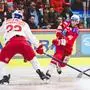 KLAGENFURT,AUSTRIA,14.APR.24 - ICE HOCKEY - ICE Hockey League, play off final, Klagenfurter AC vs EC Red Bull Salzburg. Image shows Dennis Eamon Robertson (EC RBS) and Johannes Bischofberger (KAC). Photo: GEPA pictures/ Daniel Goetzhaber