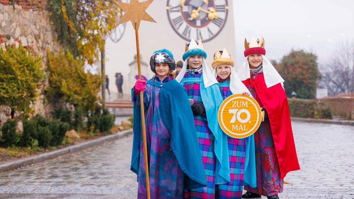 Sternsinger vor dem Grazer Uhrturm 