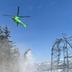 Helikopter hebt für Schneeräumung ab