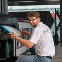 Martin Meieregger in seinem Fotoatelier in Bruck – dort werden Bilder auch professionell gedruckt
