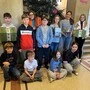 Schüler und Schülerinnen der Klassen 1c, 4a und 4b haben dieses Jahr Geschenke für die Weihnachtspakerlaktion gespendet
