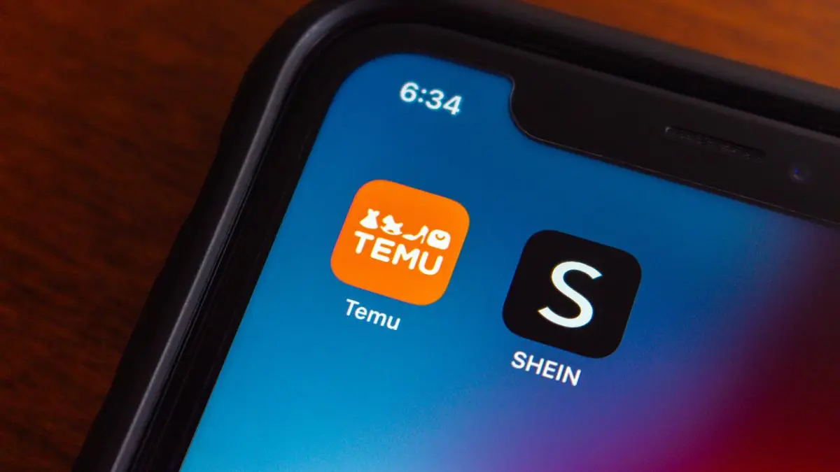 Vancouver, CANADA - Dec 25 2023 : Temu and Shein app icons seen in an iPhone.
