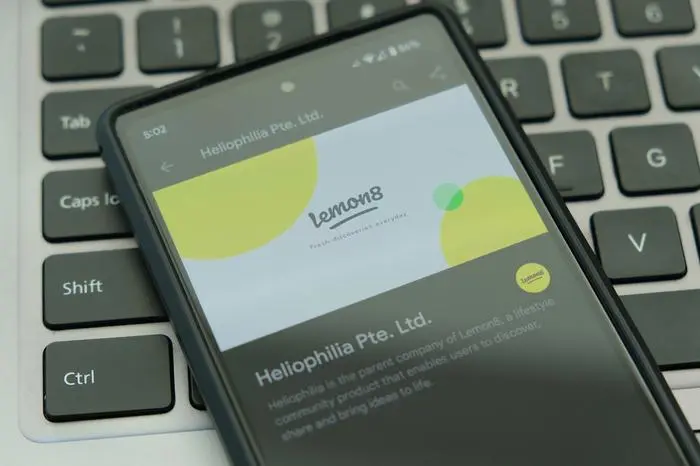 Benidorm, Spain - April 08, 2023: Smartphone screen with Lemon8 app. Lemon8 is photo-based app that resembles mixture of Instagram and Pinterest, video and photo-sharing social media app.